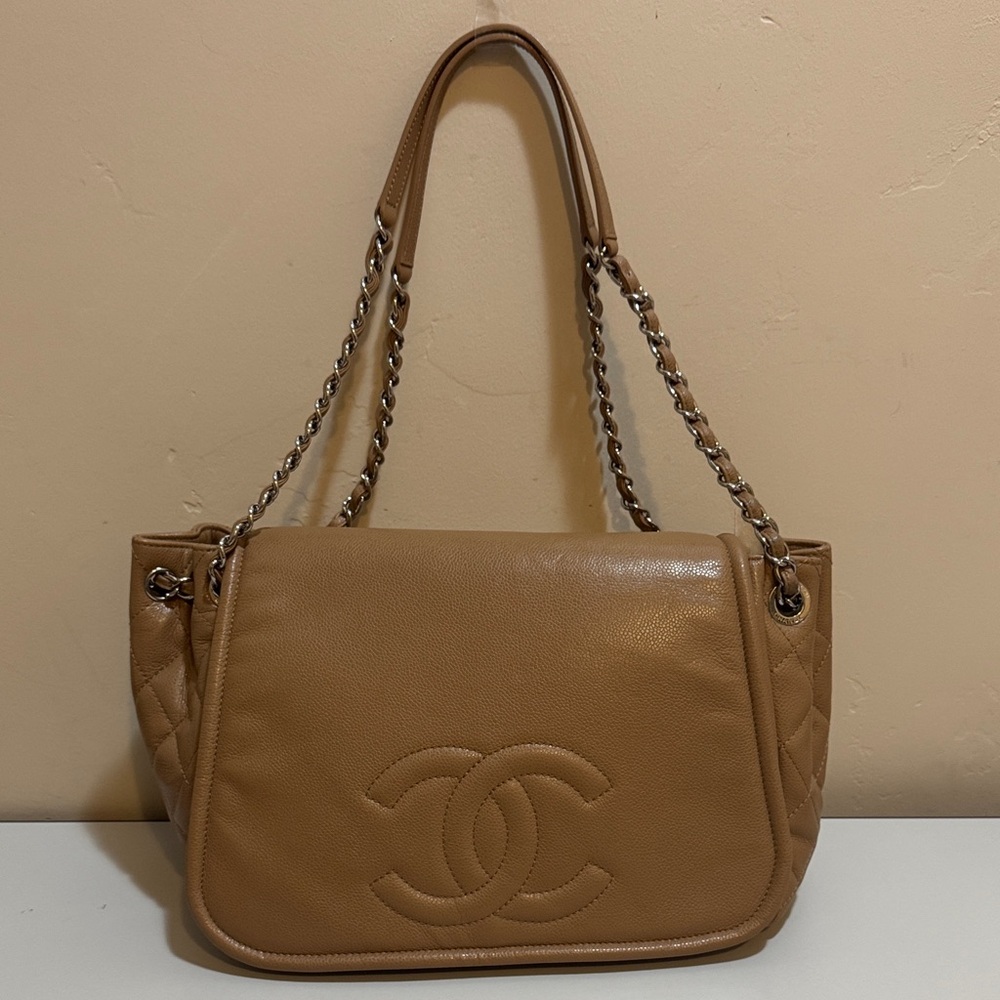 CHANEL✨ Timeless Half Moon Flap Bag in camel/dark beige caviar leather.